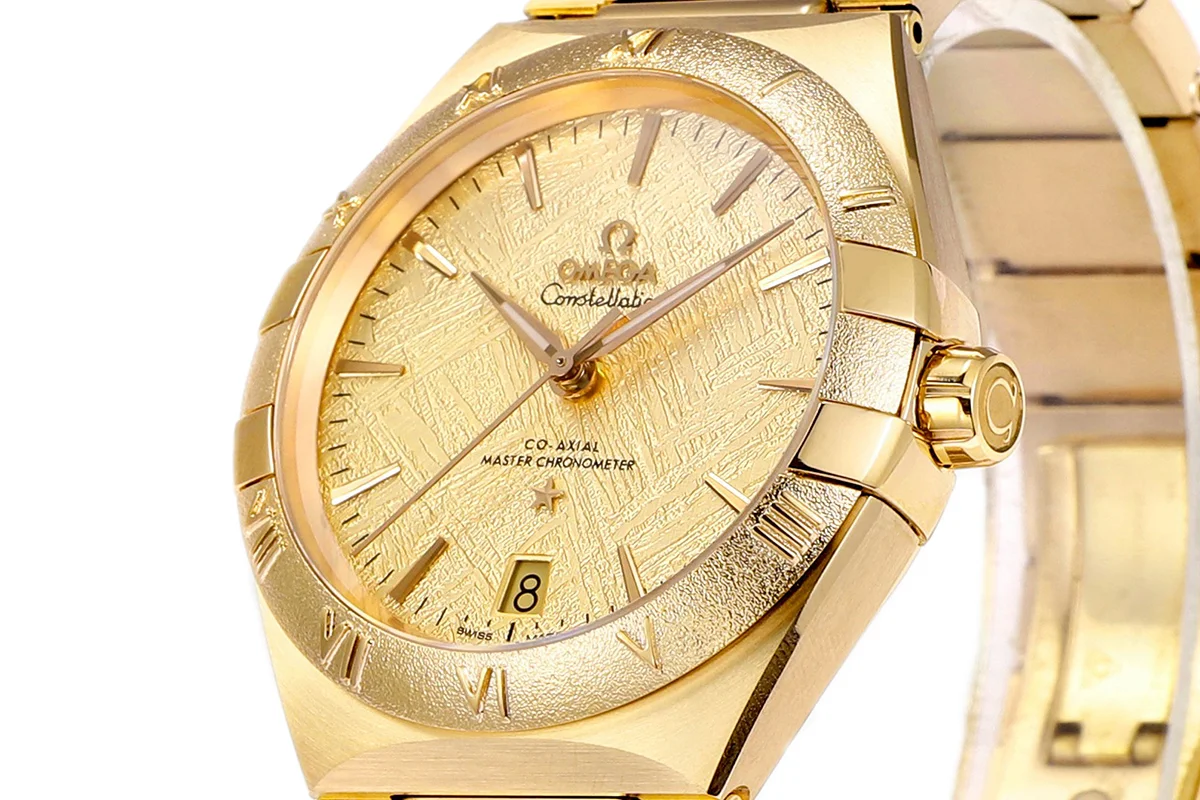 Constellation Co-Axial Master Chronometer 41mm Champagne Meteorite Dial in Yellow Gold on Bracelet