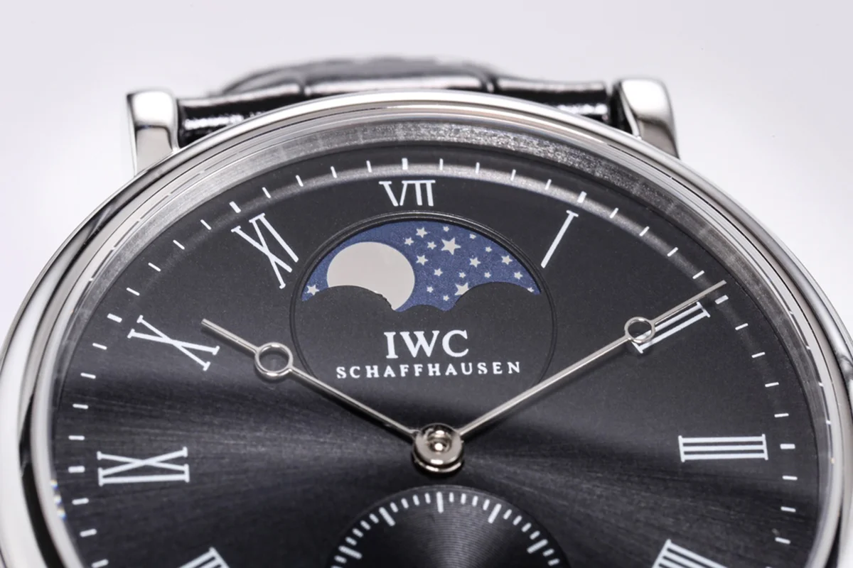 Portofino Hand Wound Moon Phrase IW5548 Black Dial in Steel