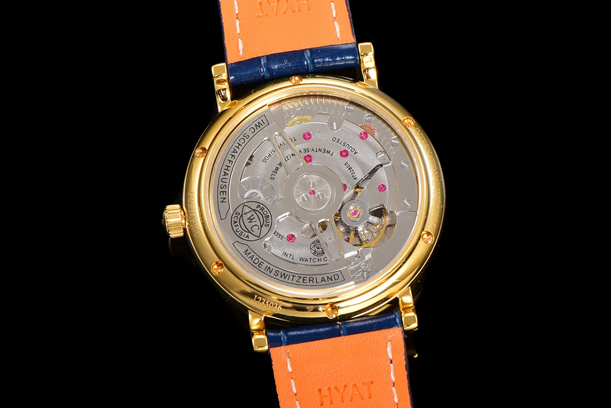 Portofino Hand Wound Moon Phrase IW5548 White Dial in Yellow Gold